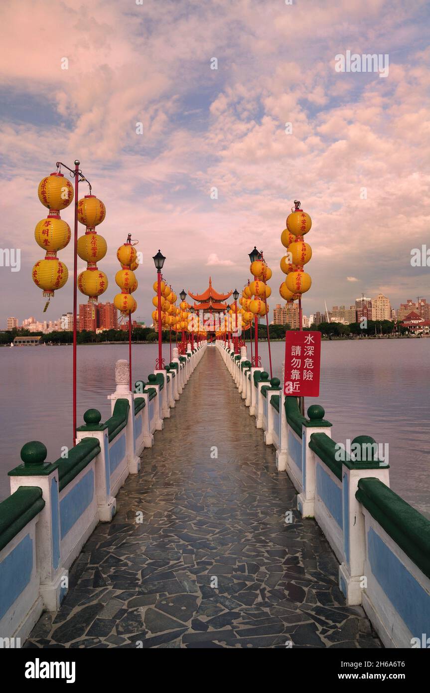 A vertical shot of the temples and lanterns at Lotus Lake in Kaohsiung, Taiwan Stock Photo