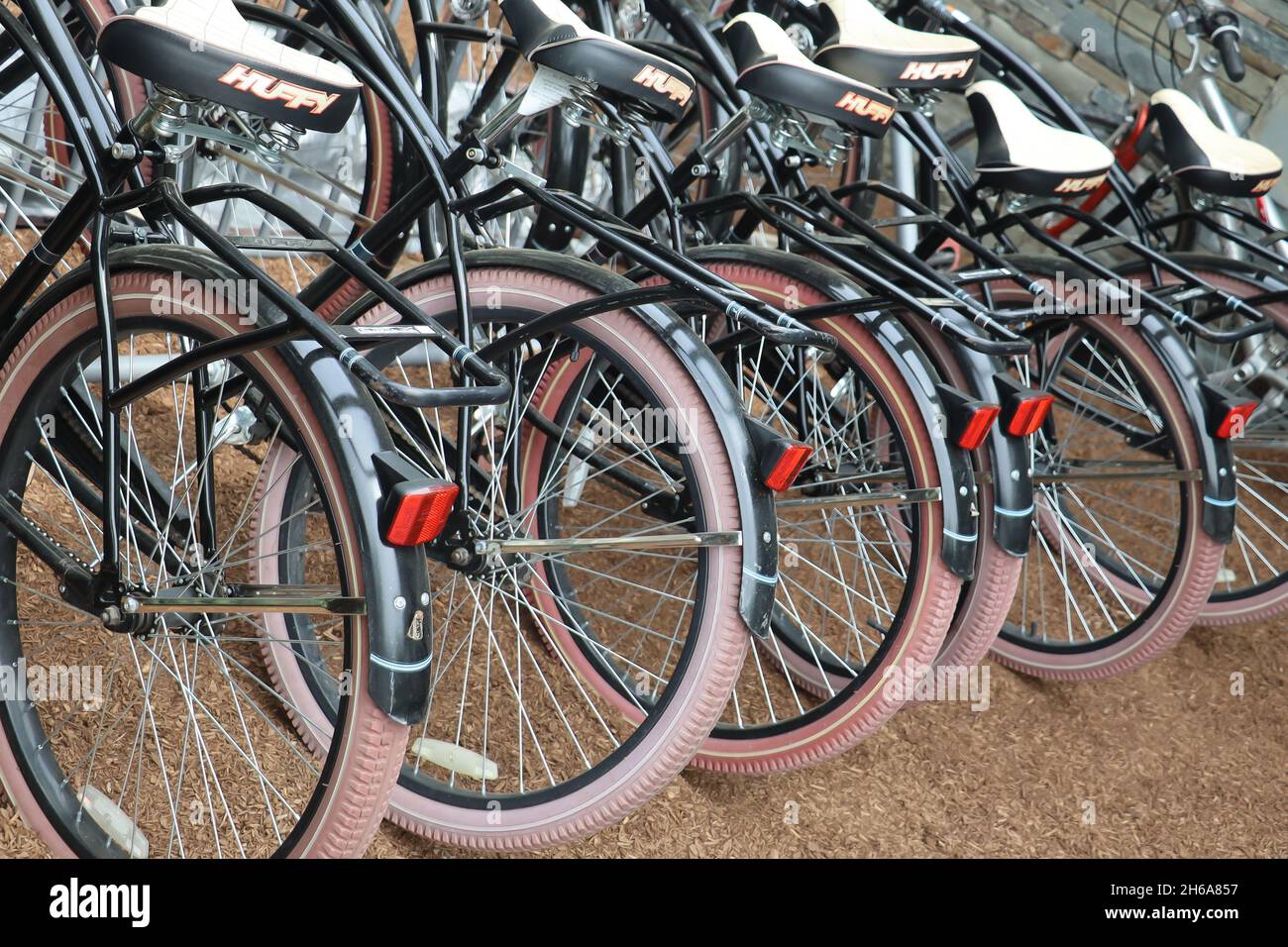 rear wheels of Huffy bikes in a rack waiting for someone to ride at Mt Tremper NY May 22 2021 Stock Photo