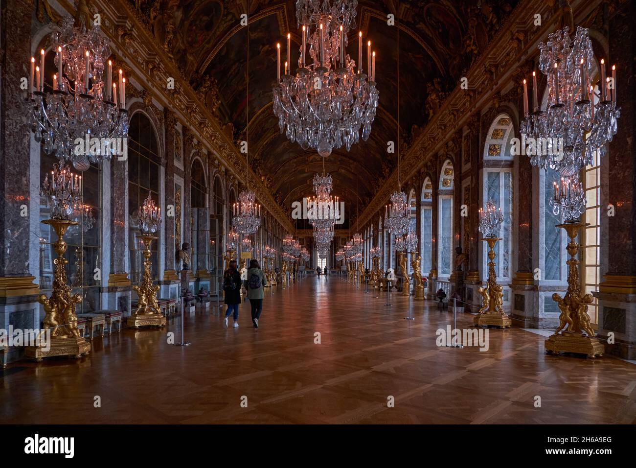Hall of mirrors at Versailles Palace (Chateau de Versailles) with Golden Details near Paris, France. Magnificent Royal palace added to UNESCO list of Stock Photo