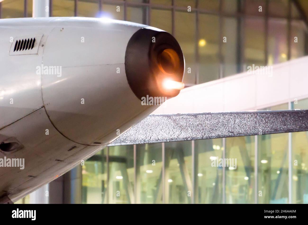 The auxiliary power unit APU of the airplane light on, night Stock