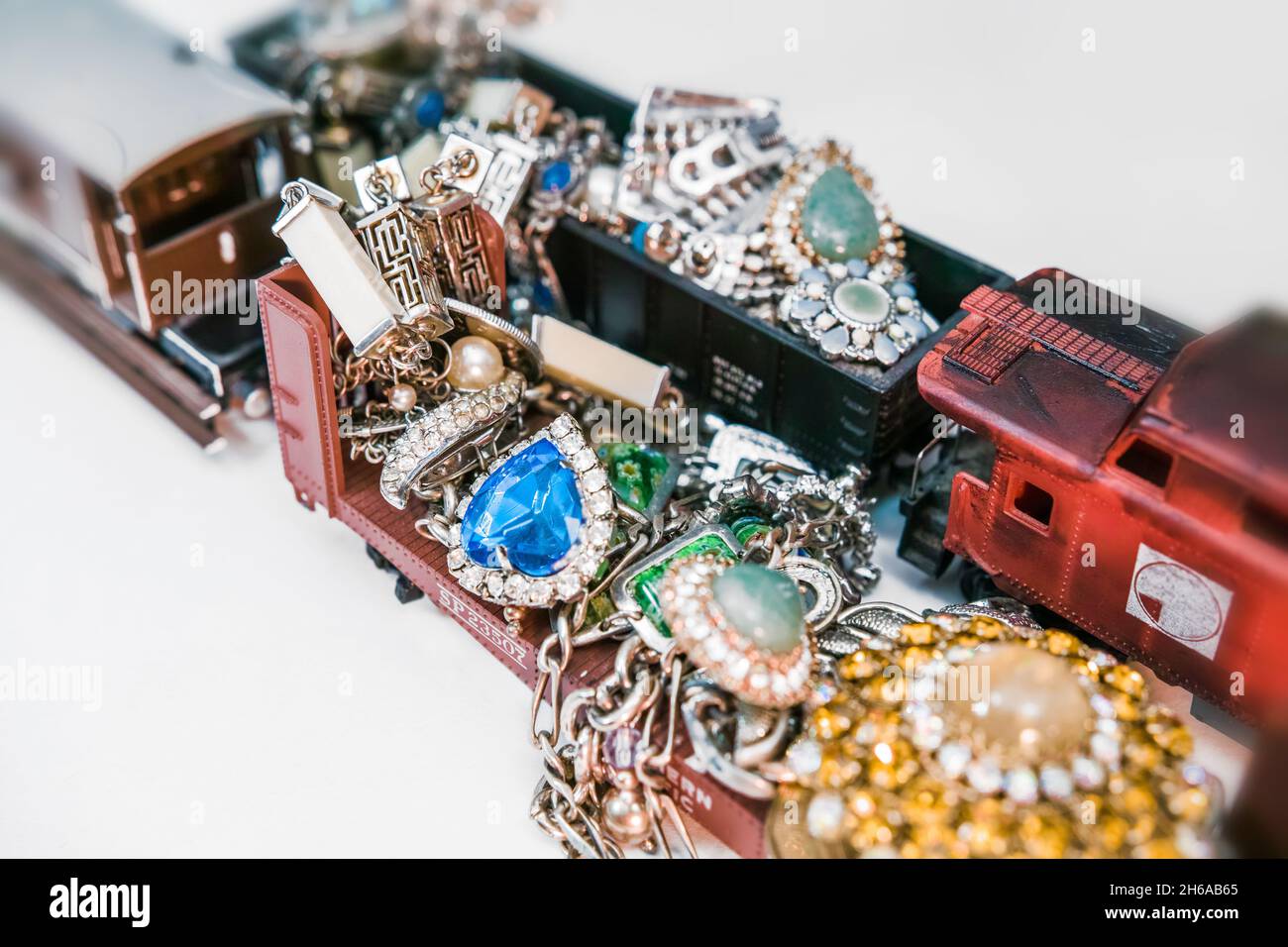 Toy trains transporting jewels. Stock Photo