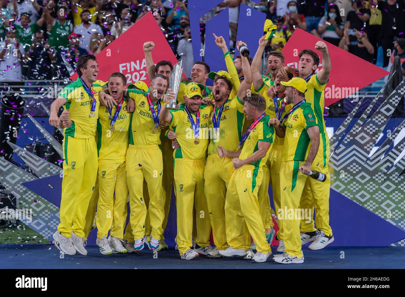 Australia celebrate with the ICC T20 World Cup trophy after an eight wicket victory over New Zealand in the ICC Mens T20 World Cup final match between Australia and New Zealand at