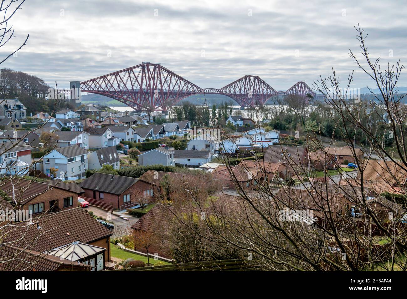 The Forth Rail Bridge and views over North Queensferry, from the Fife Coastal Path, Fife, Scotland. Stock Photo