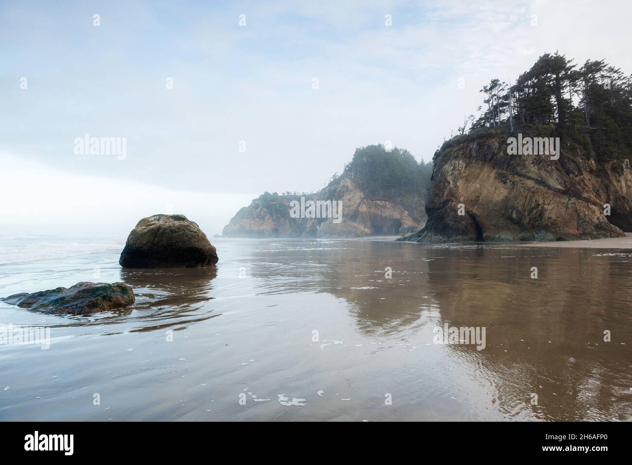 Hug point beach by a foggy morning Stock Photo