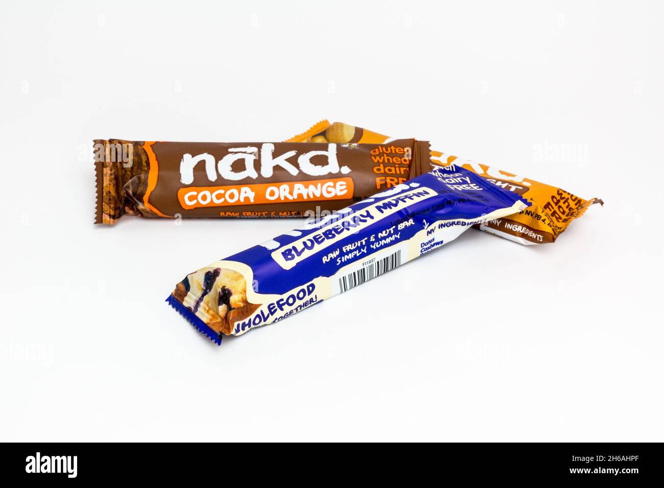 Nakd energy bars in cocoa orange and blueberry muffin flavor on white background Stock Photo