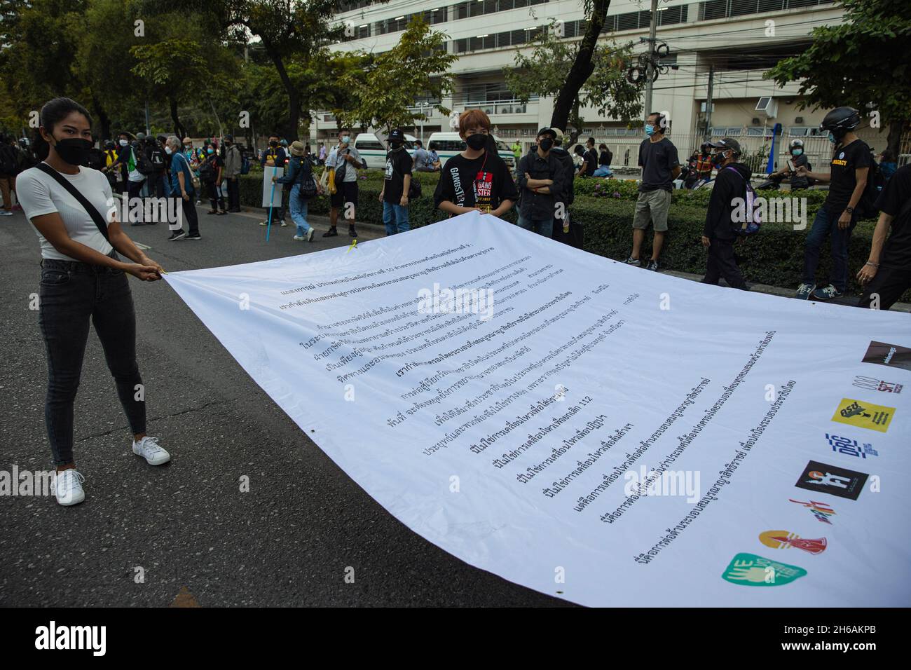 Protesters hold a huge banner during the demonstration.Pro-democracy ...