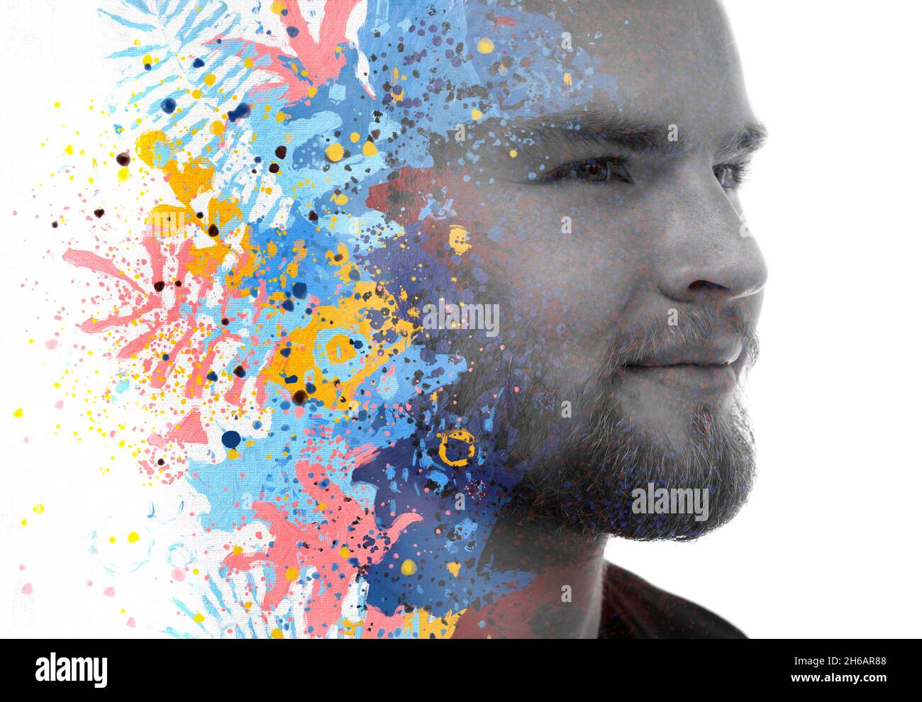A double exposure portrait of a young man combined with a digital image ...