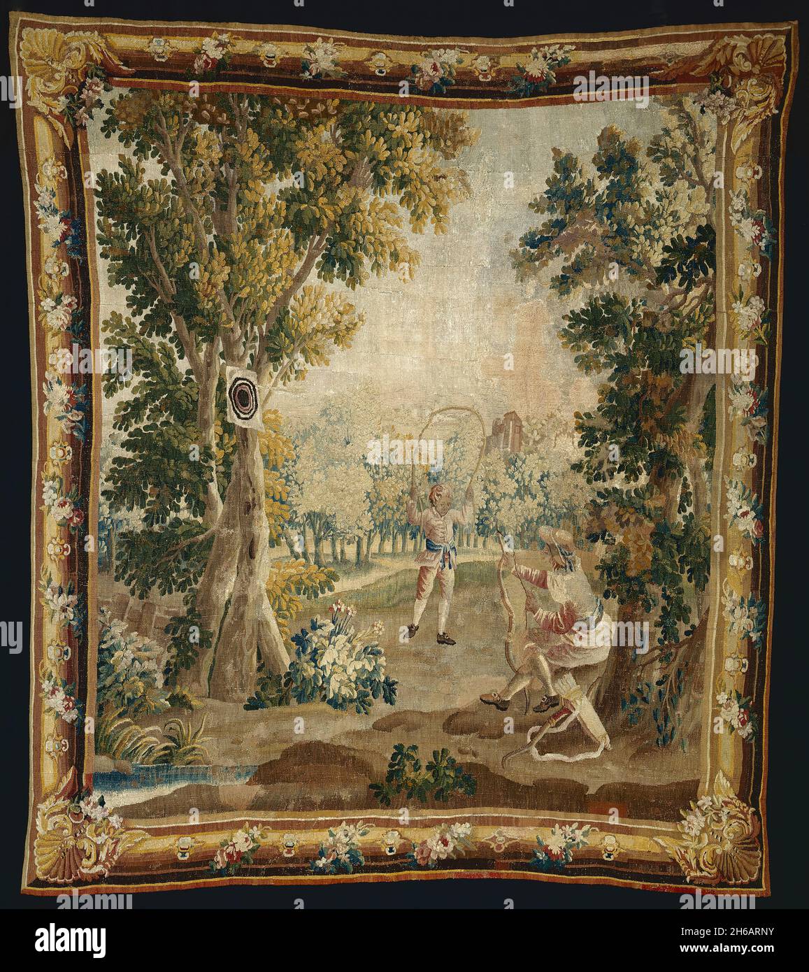 Archery from Amusements Champ&#xea;tres (Country Sports), Aubusson, 1770/90. Woven at the Manufacture Royale d'Aubusson, France, aAfter a design in the manner of Fran&#xe7;ois Boucher, attributed to Jacques-Nicolas Julliard. Stock Photo