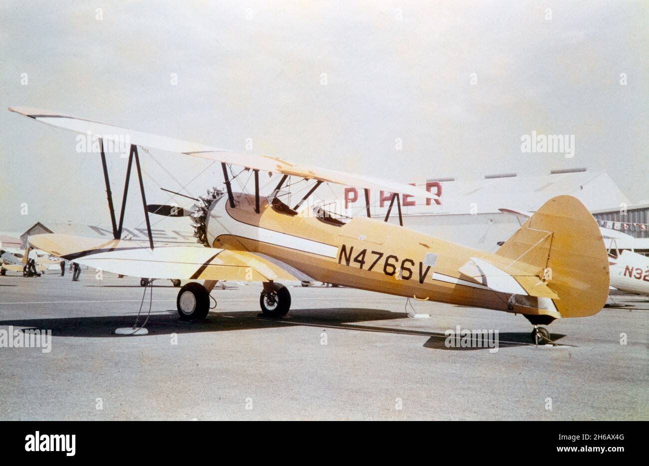 Vintage photograph taken on 5th June 1965 at The Antique Airplane Association Fly-In at Merced, California, USA. A Stearman 75, serial number N4766V, powered by a Pratt and Whitney R-985 engine. Stock Photo