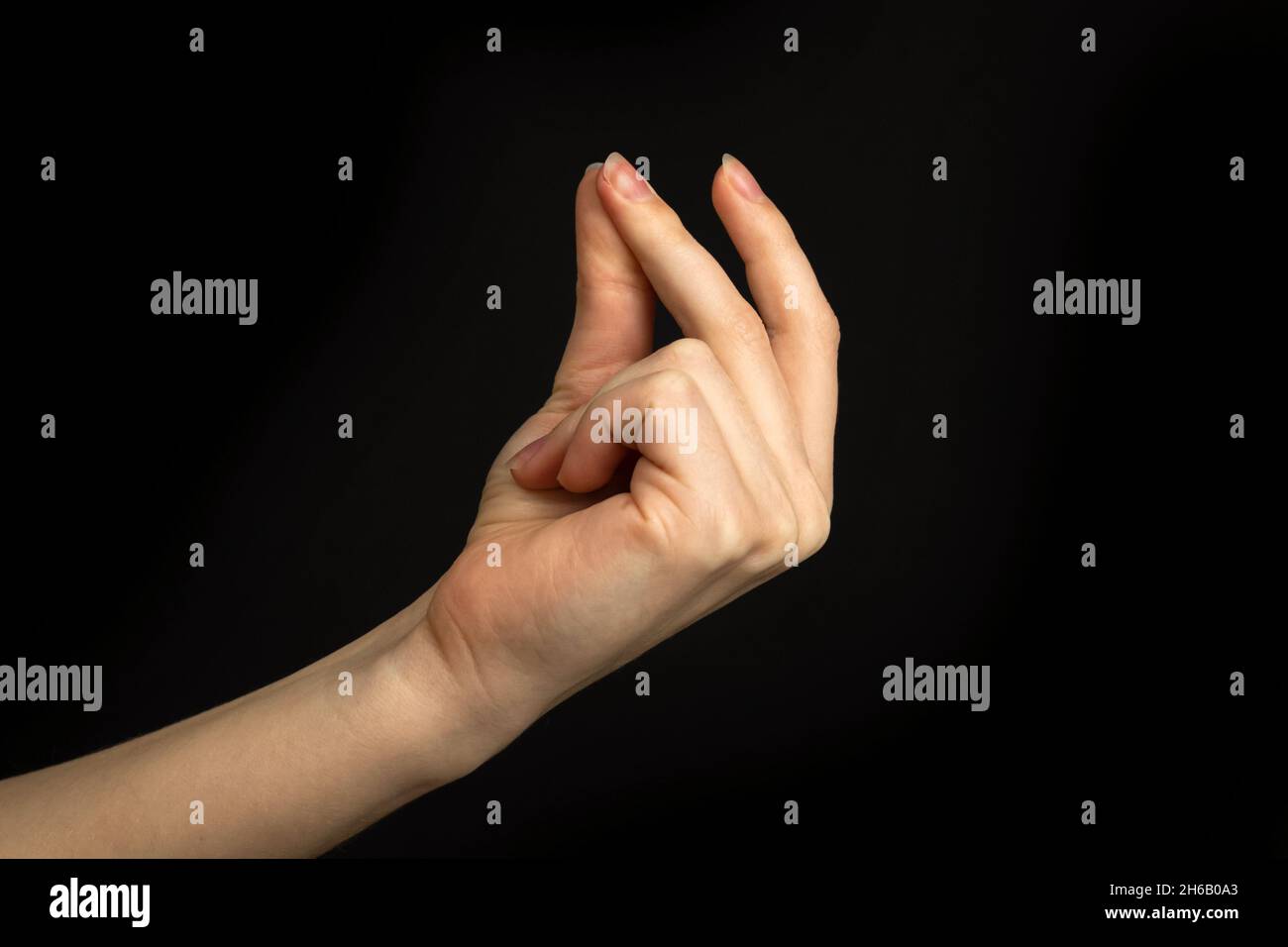 Hand gesture snapping fingers, easy sign and symbol on a black ...