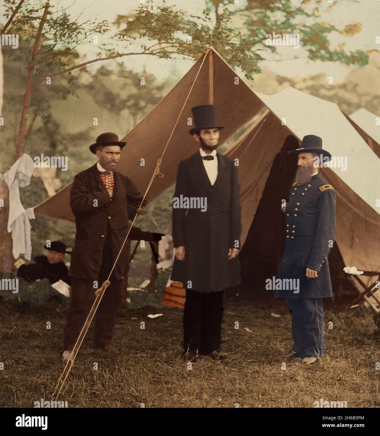 [President Abraham Lincoln, Major General John A. McClernand (right), and E. J. Allen (Allan Pinkerton, left), Chief of the Secret Service of the United States, at Secret Service Department, Headquarters Army of the Potomac, near Antietam, Maryland], October 3, 1862. (Colorised black and white print). Stock Photo