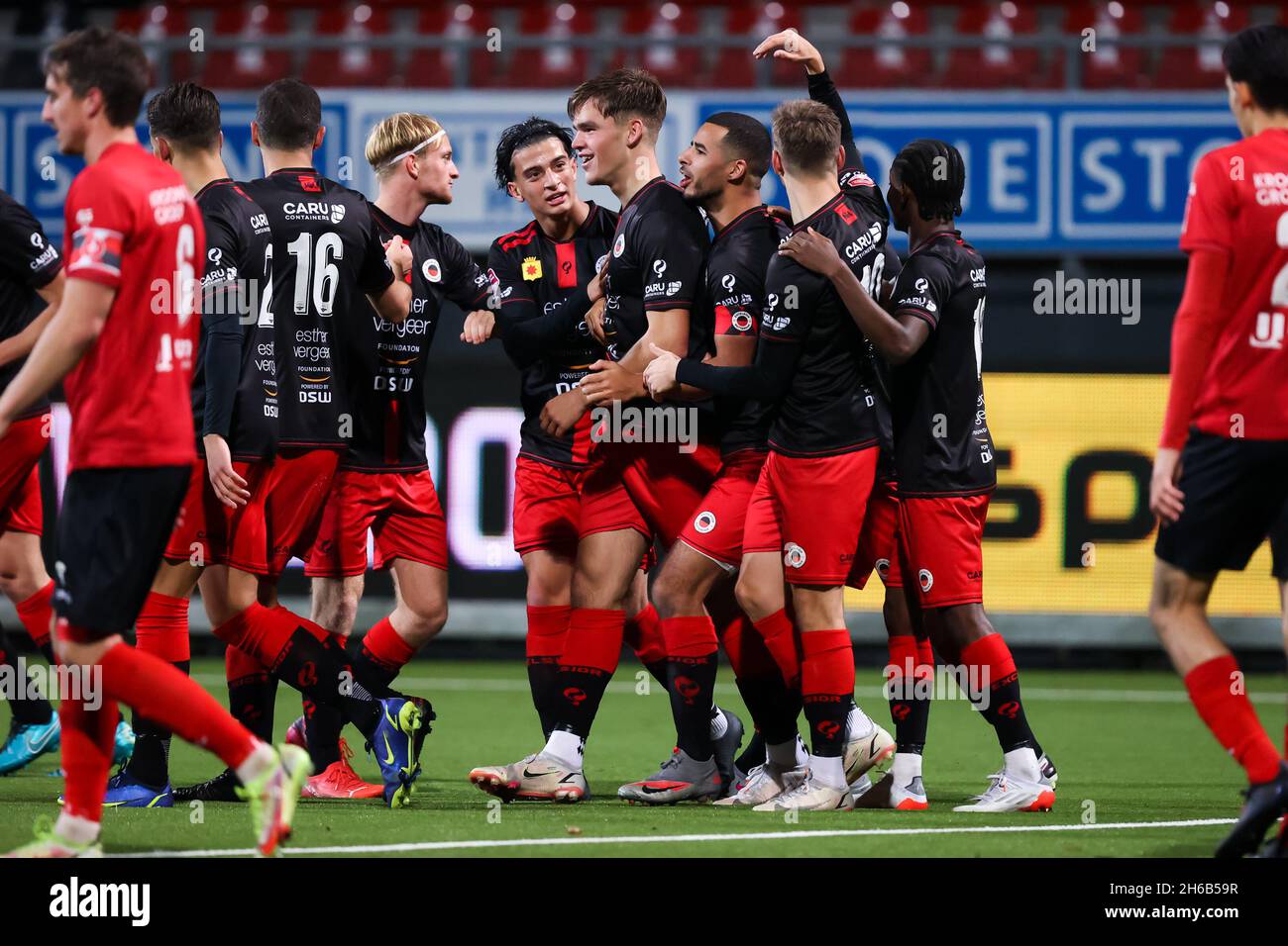 ROTTERDAM, NETHERLANDS - NOVEMBER 14: Abdallah Aberkane of Excelsior Rotterdam, Thijs Dallinga of Excelsior Rotterdam and Redouan El Yaakoubi of Excelsior Rotterdam celebrate their sides third goal during the Dutch Keukenkampioendivisie match between Excelsior and Almere City FC at the Van Donge & De Roo Stadion on November 14, 2021 in Rotterdam, Netherlands (Photo by Herman Dingler/Orange Pictures) Stock Photo