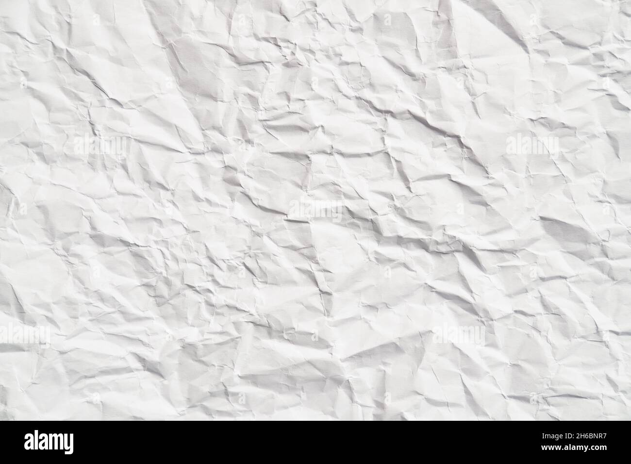 White crumpled paper texture with wrinkles. Damaged and torn sheet ...