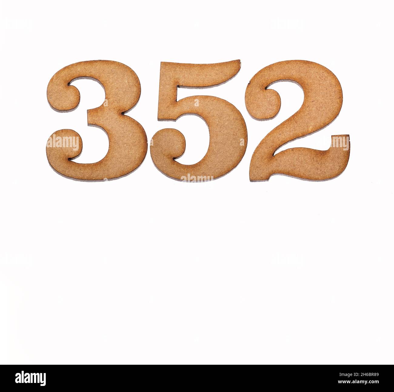 Number 352 in wood, isolated on white background Stock Photo - Alamy