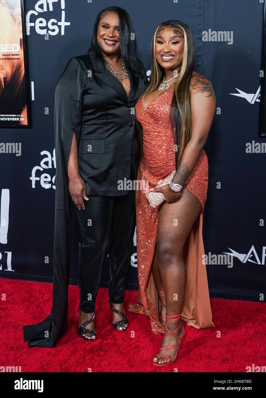 Hollywood, United States. 14th Nov, 2021. HOLLYWOOD, LOS ANGELES, CALIFORNIA, USA - NOVEMBER 13: Rapper Erica Banks arrives at the 2021 AFI Fest - Official Screening Of Netflix's 'Bruised' held at the TCL Chinese Theatre IMAX on November 13, 2021 in Hollywood, Los Angeles, California, United States. (Photo by Nox Yang/Image Press Agency) Credit: Image Press Agency/Alamy Live News Stock Photo