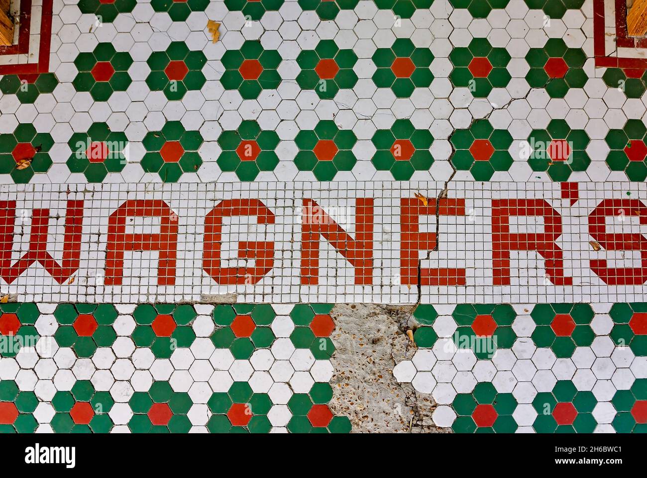 Vintage floor tile decorates a sidewalk in front of Wagner’s Department Store, June 2, 2012, in Water Valley, Mississippi. Stock Photo