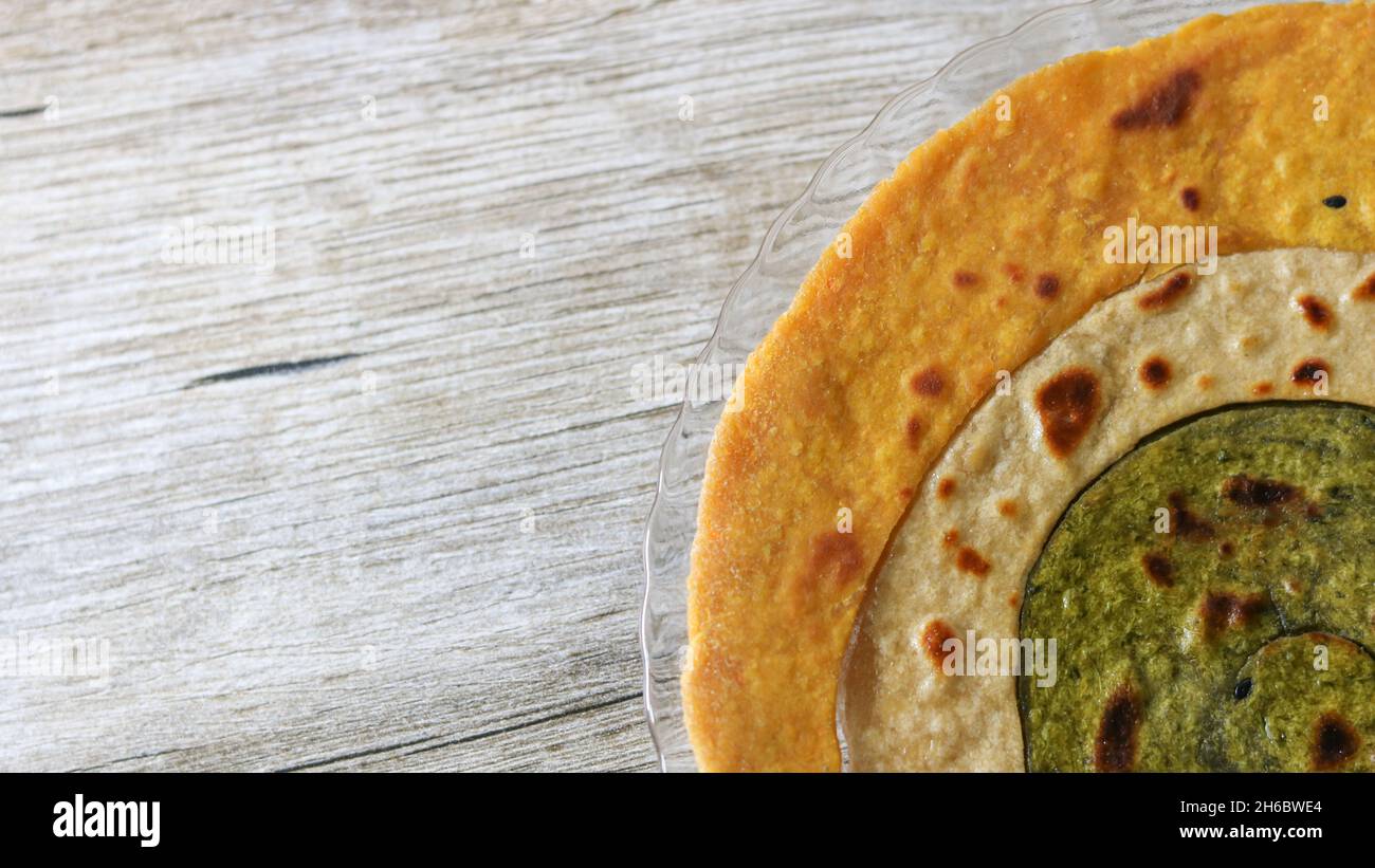 Paratha is the flatbread which is basically an Indian dish. Paratha can be plain or stuffed. The paratha is mainly made up of maida or wheat flour. Stock Photo