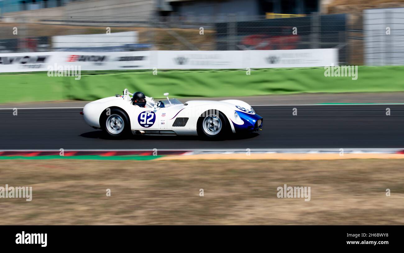 Italy, september 11 2021. Vallelunga classic. Historical Lister Knobbly 60s race car on racetrack blurred motion background Stock Photo