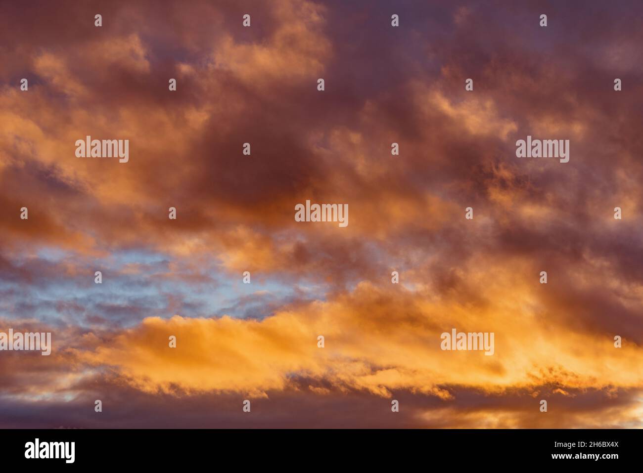 Amazing cloudscape on the sky at sunset time after rain Stock Photo - Alamy