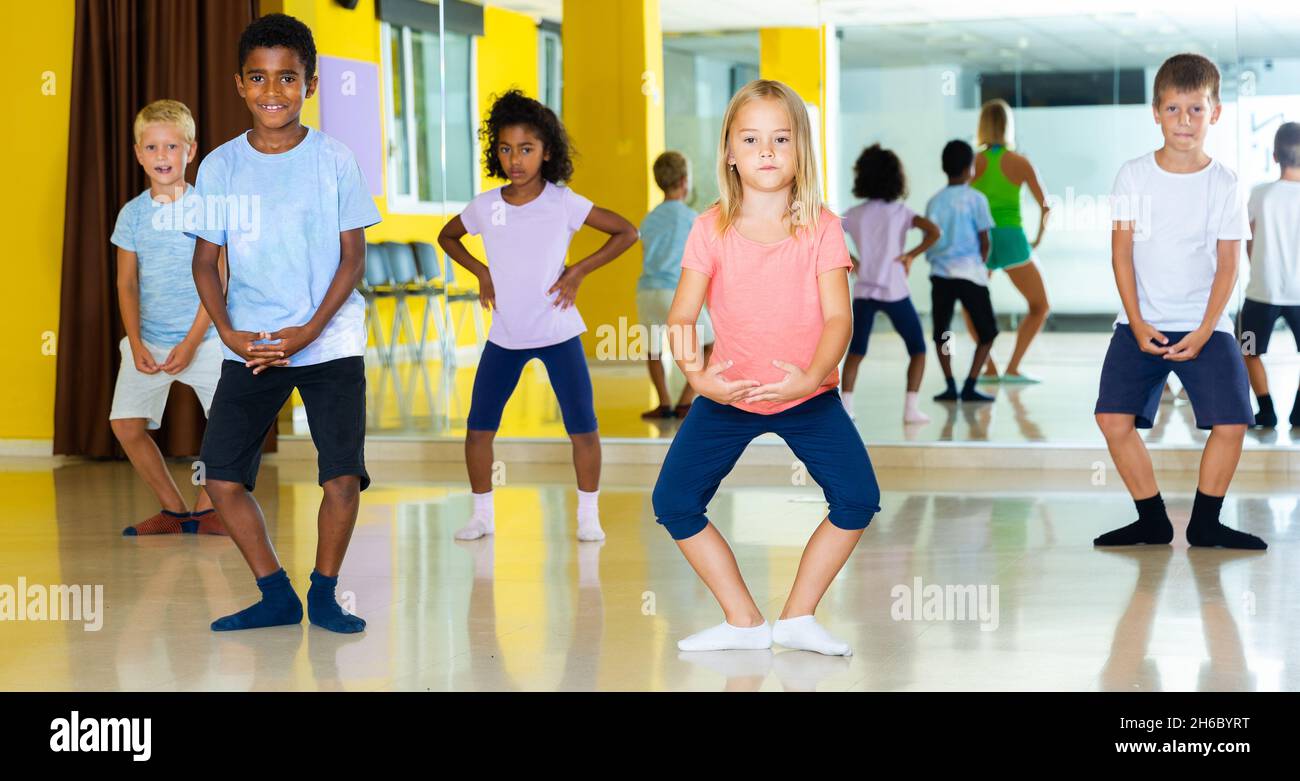 Active young children posing at dance class Stock Photo Alamy