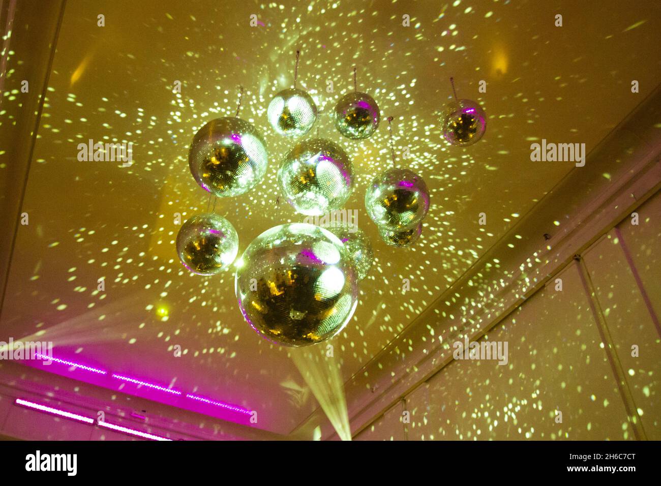 Shining disco balls hanging from the ceiling Stock Photo Alamy