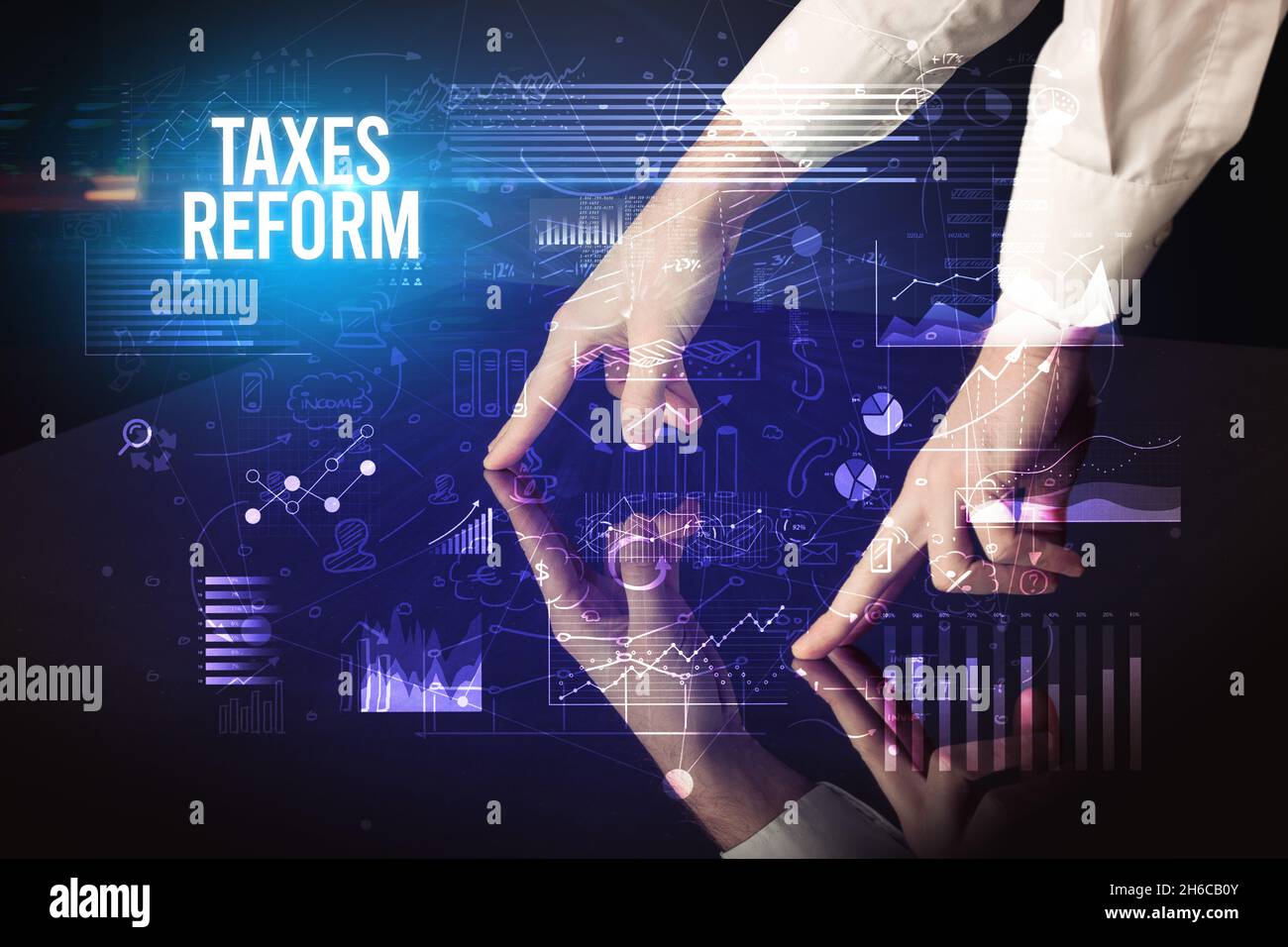 Businessman touching huge screen concept Stock Photo