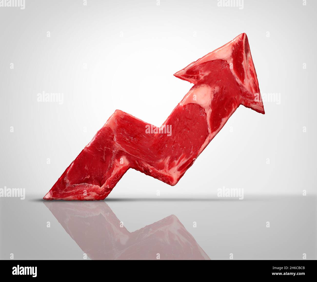 Rising meat prices and food price inflation or global beef industry surging in expensive cost as a raw red rib steak shaped as an increasing arrow. Stock Photo