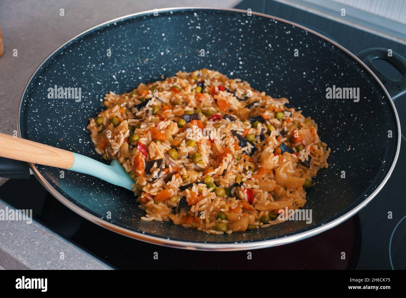 Tasty rice with vegetables prepared in wok Stock Photo Alamy