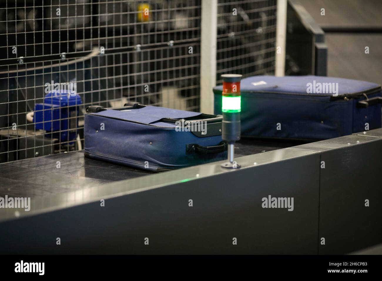 Baggage on a conveyor belt inside a luggage sorting system at an airport Stock Photo Alamy