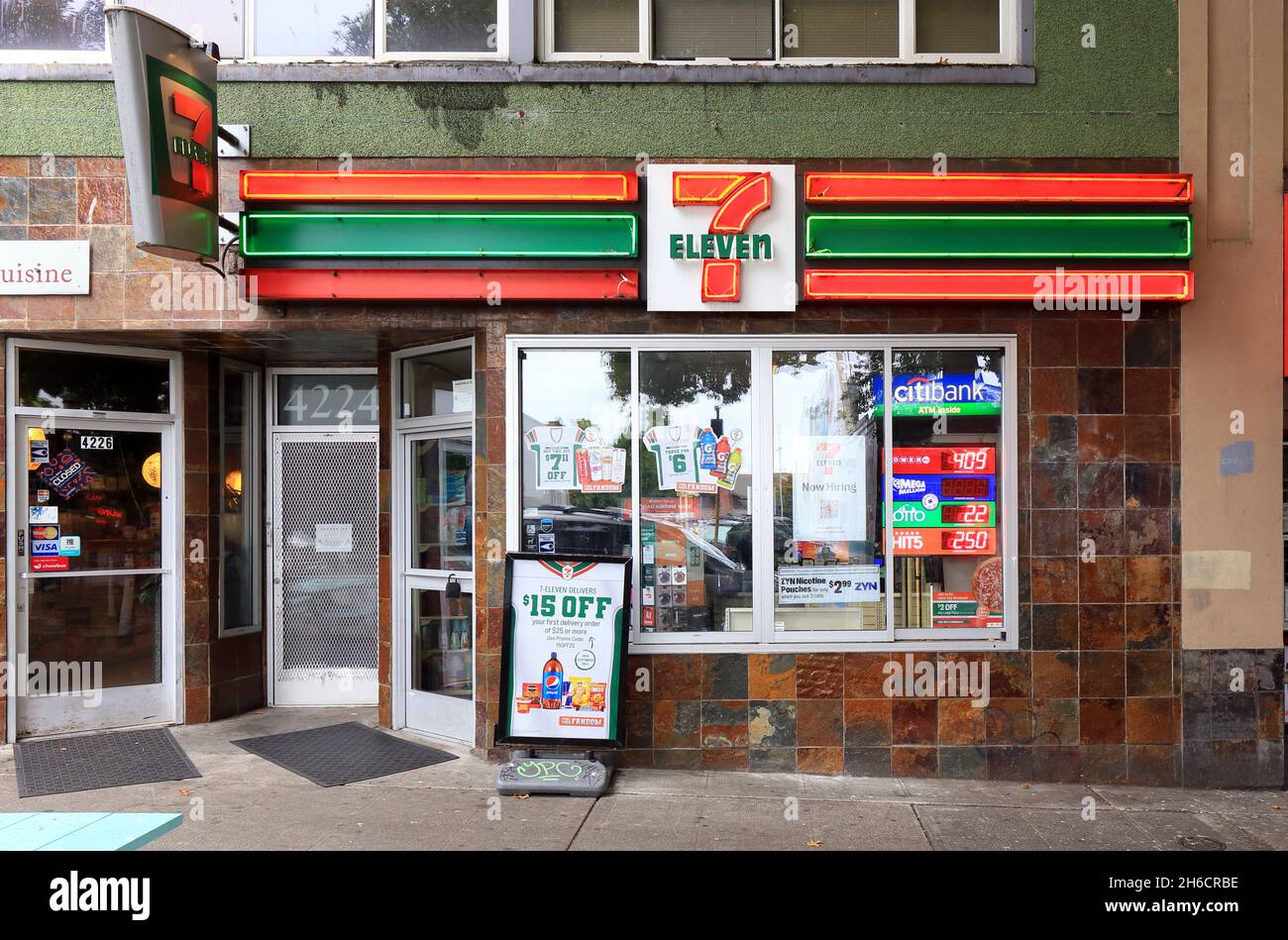 7-Eleven, 4224 University Way NE, Seattle, Washington. exterior storefront of a convenience store in the University District. Stock Photo