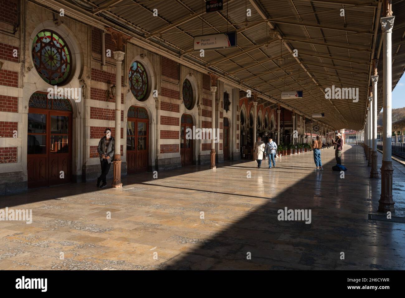 Istanbul, Turkey-Nov.12, 2021: Silhouettes of people waiting for the train in famous Sirkeci Train Station in Istanbul. Stock Photo