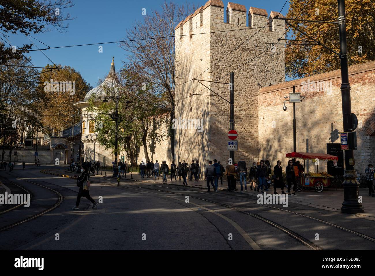 Istanbul, TurkeyNov.12, 2021 People enjoy the nice weather and eat street food in famous