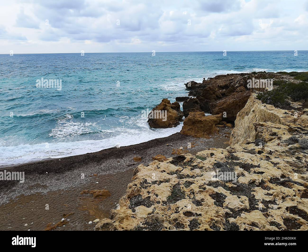 Landscape view of the rocks on the beach Stock Photo - Alamy