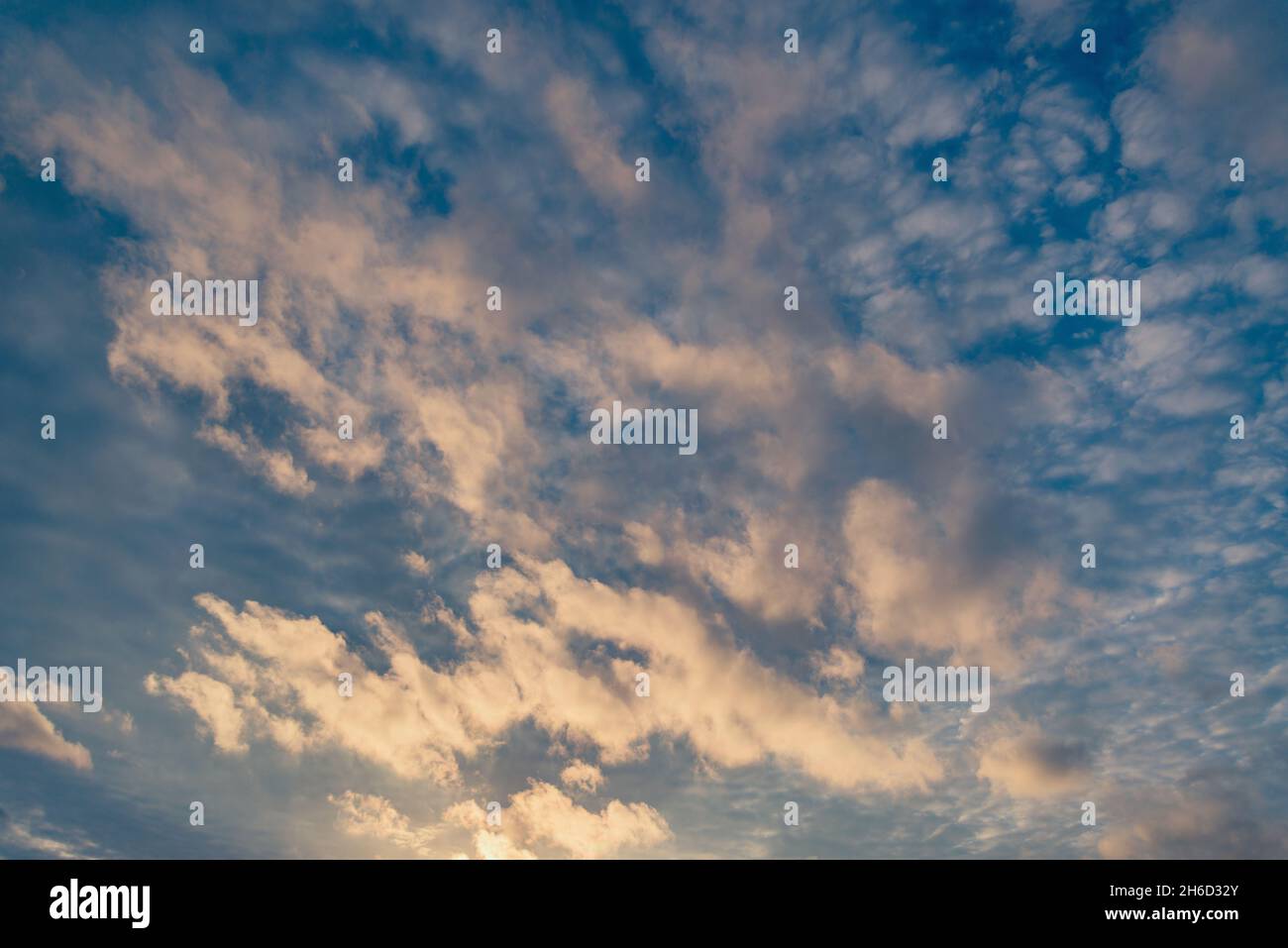 Amazing cloudscape on the sky at sunset time after rain Stock Photo - Alamy
