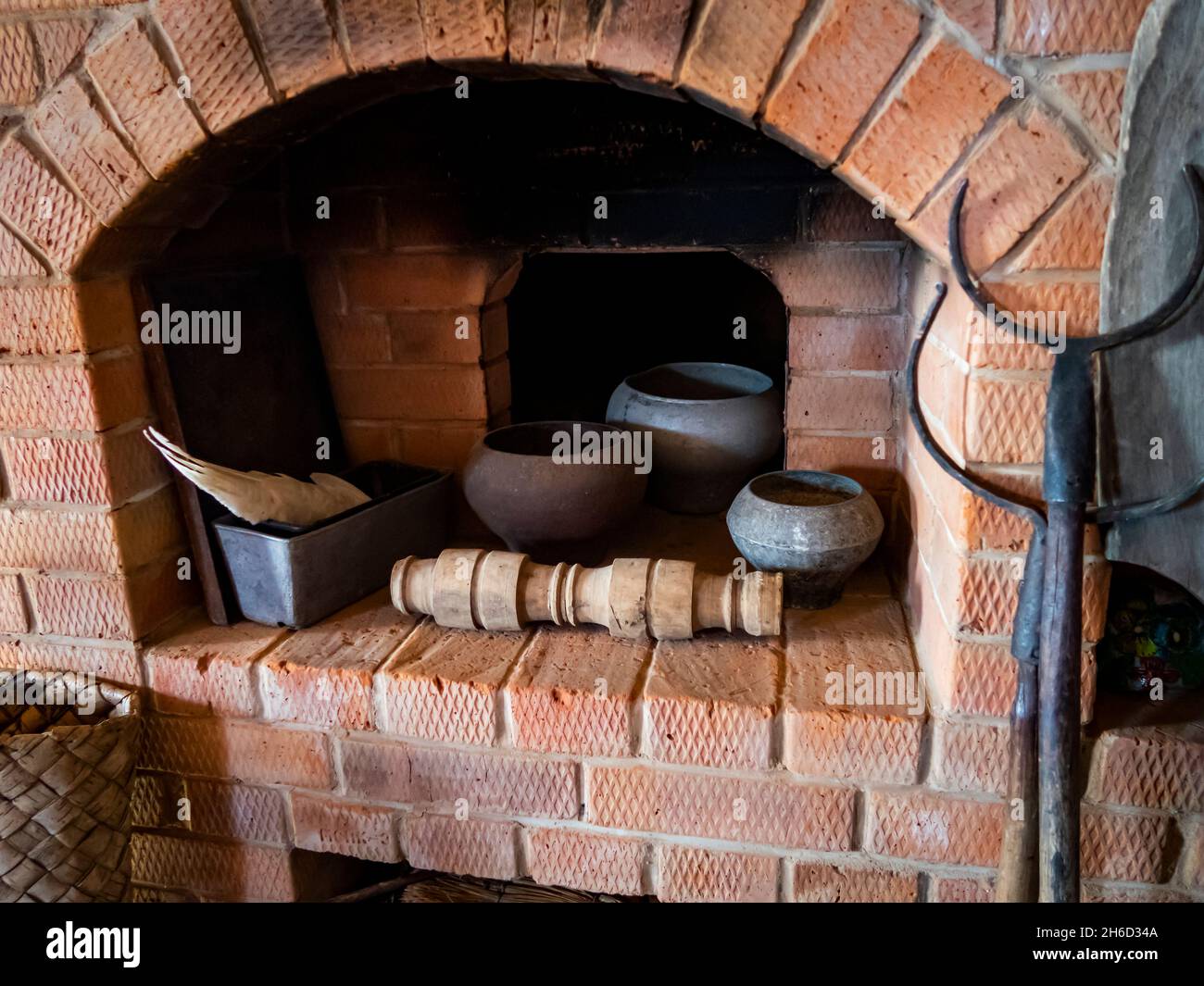 Russian traditional oven with kitchen utensils of the 19th century