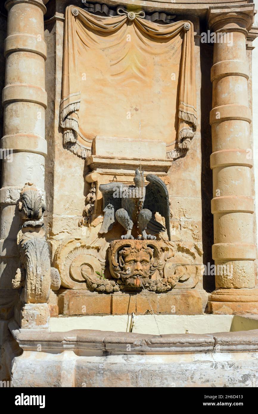 Sculpture and drinking fountain on the front of the main guard building