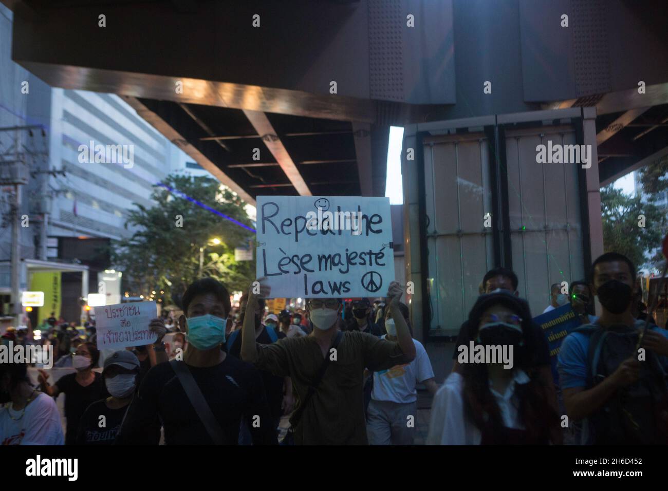Bangkok, Thailand. 14th Nov, 2021. Demonstrators held up banners for the repeal of the lèse majesté law (Article 112). (Photo by Atiwat Silpamethanont/Pacific Press) Credit: Pacific Press Media Production Corp./Alamy Live News Stock Photo