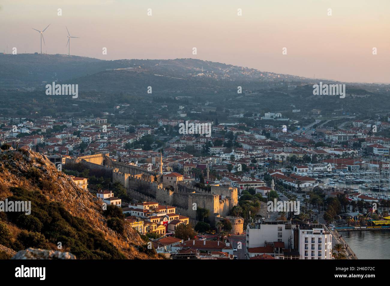 Çeşme Castle in Çeşme, Izmir Provence, Turkey. Pictured at sunset. Stock Photo