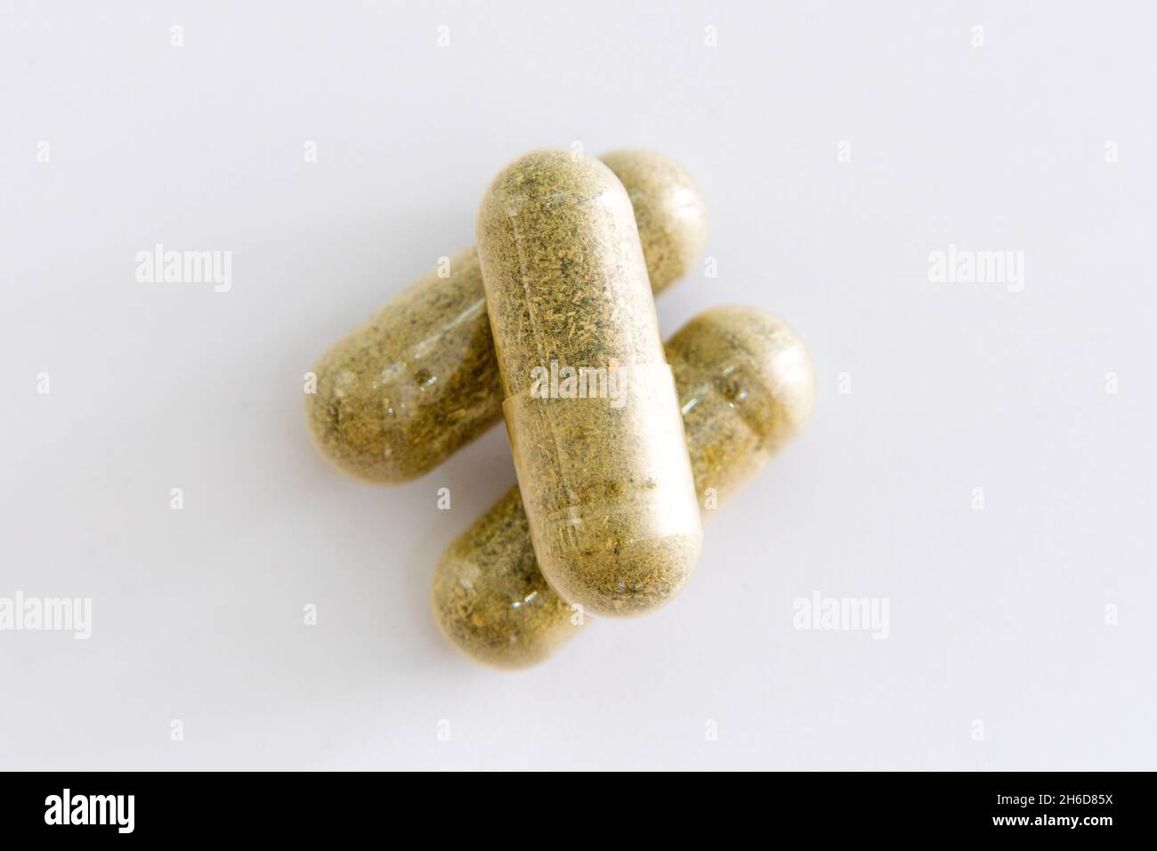 Top view of pill capsule on white background. Herb for treatment coronavirus or covid19. Drug and medicine concept. Stock Photo