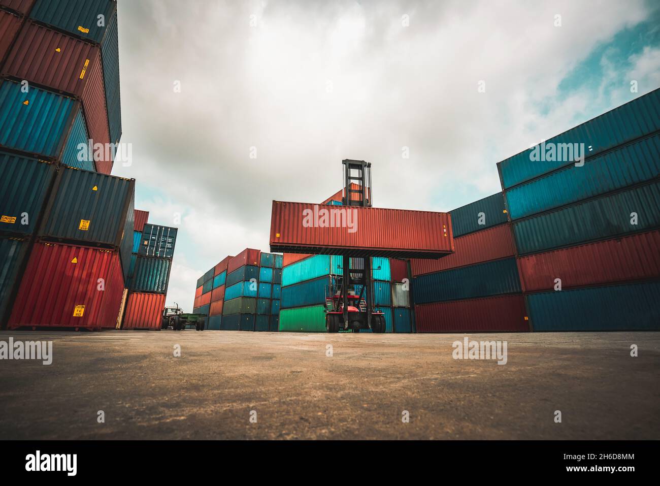 Cargo container for overseas shipping in shipyard with heavy machine