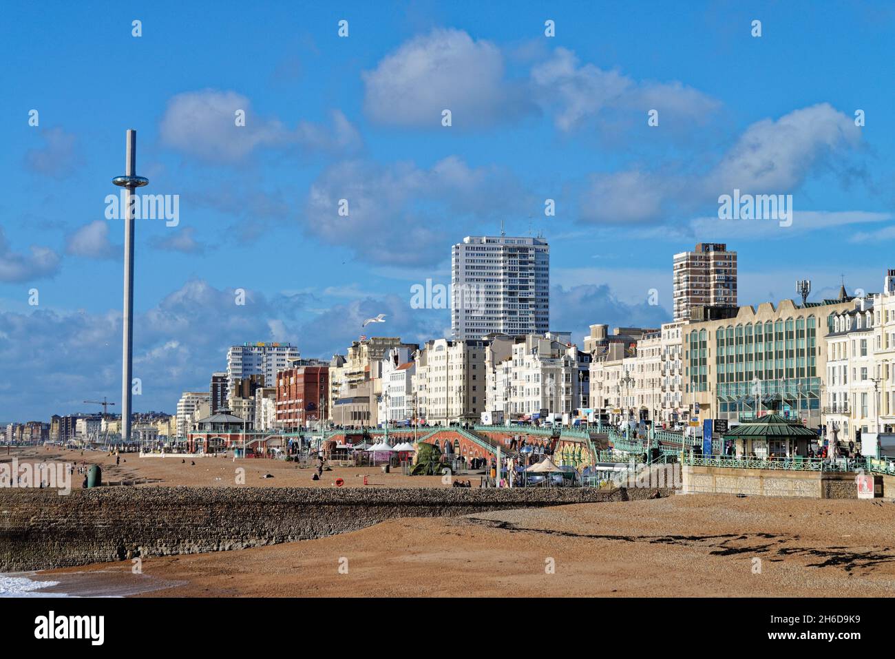 The view of Brighton town centre seafront looking west  from the Palace Pier on sunny autumn day East Sussex England UK Stock Photo