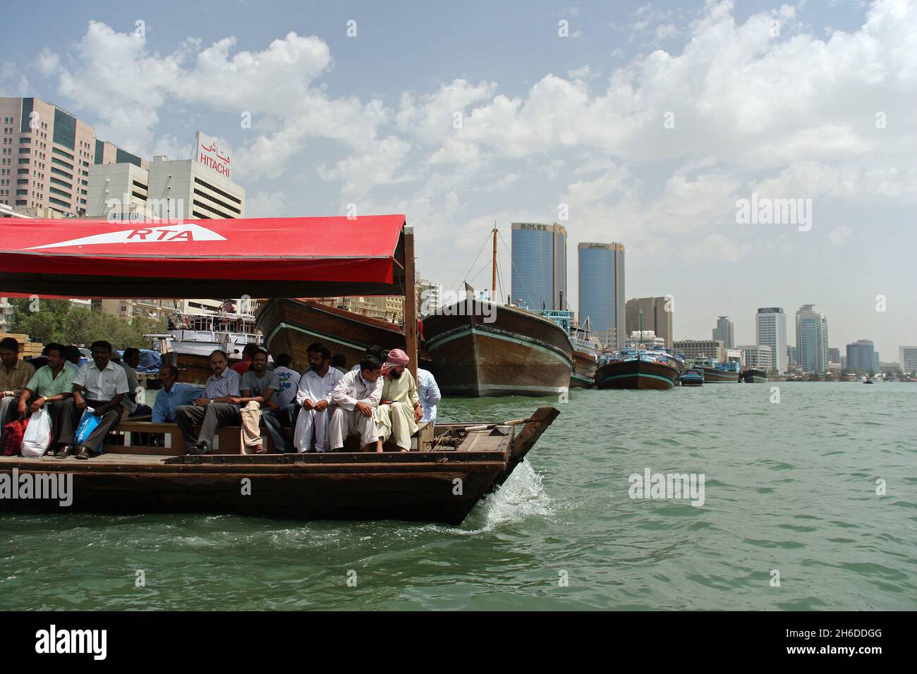 ships on Dubai Creek, Deira Twin Towers in background, United Arab Emirates, Dubai Stock Photo