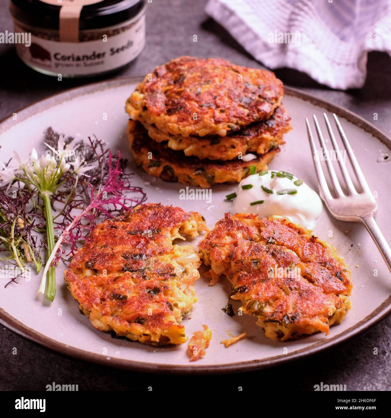 Carrot and coriander seed fritters Stock Photo Alamy