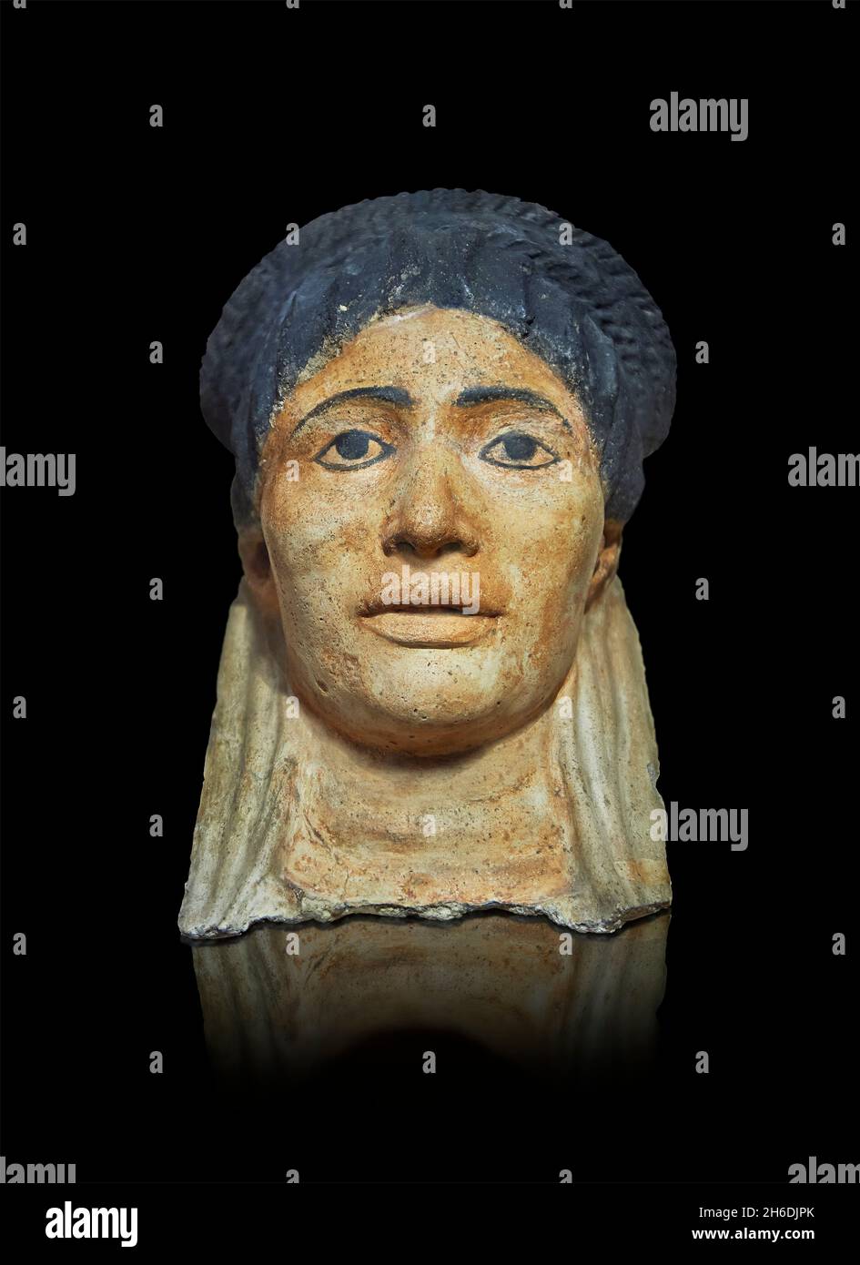 Roman Egyptian plaster funerary Mask, 100 - 150 AD, Akhmim Panopolis. Louvre Museum AF 2128. Portrait mummy. A fragment of gold leaf preserved inside Stock Photo