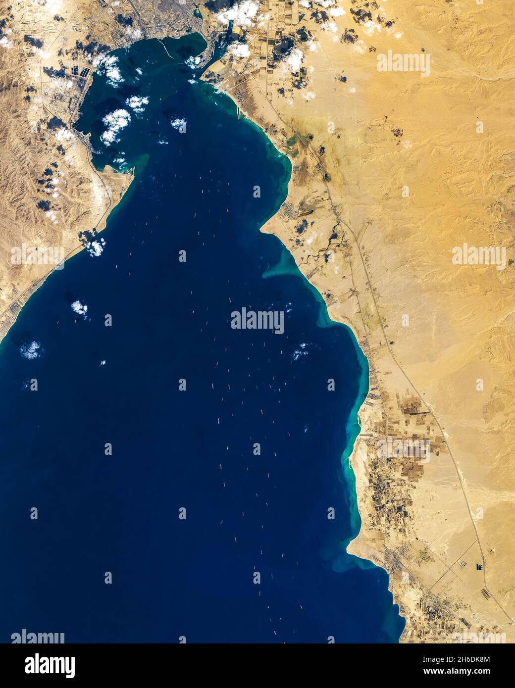 Suez Canal, Egypt, showing lines of ships waiting for pasage through  the canal. Stock Photo