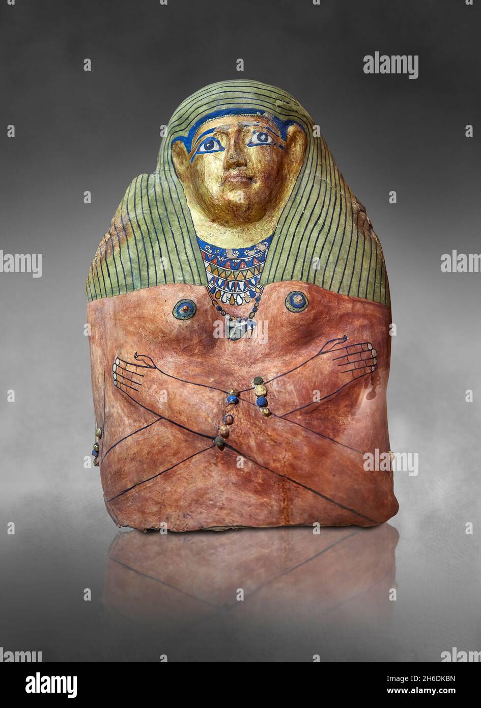 Roman Egyptian plaster funerary Mask, 30 - 395 AD, Touna el-Gebel  (Tanis). Louvre Museum AF13203. Depits a woman, gare arms crossed, 2 bracelets, 2 a Stock Photo