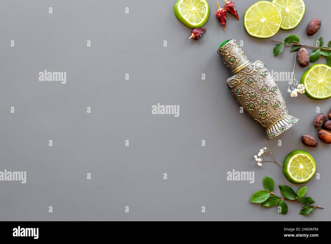 Agar wood oil or arabian oud perfume with ingredients Stock Photo Alamy