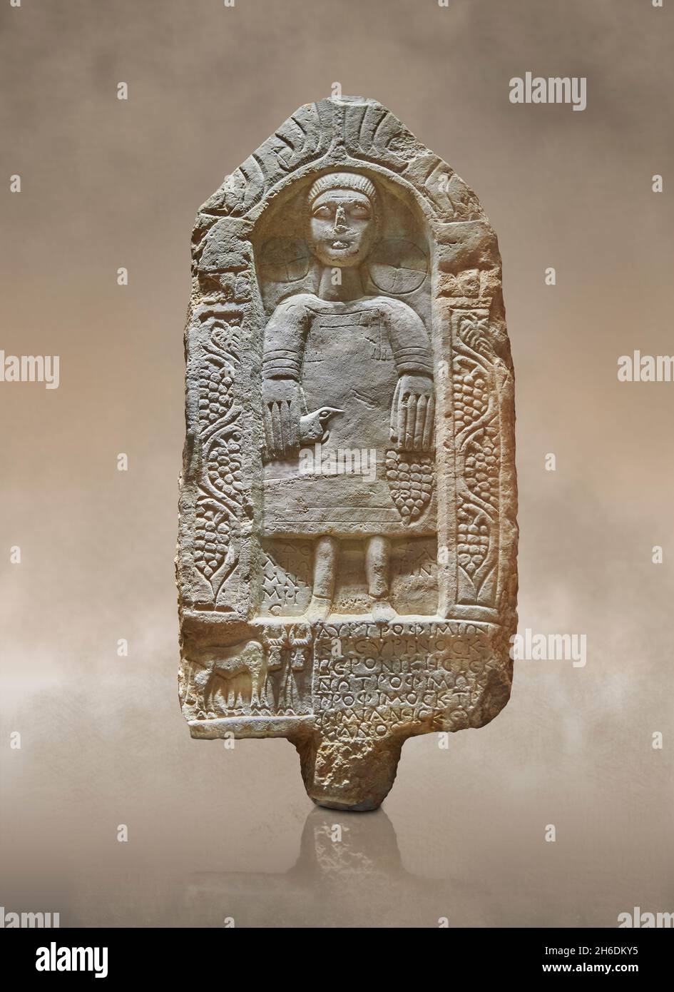 Roman Phyrigian style doorstone funerary stele of Trophimos, 250-300 AD, K��tahya Turkey. Louvre Museum Ma 4529. Depicting a young man (tunic, shod, ho Stock Photo