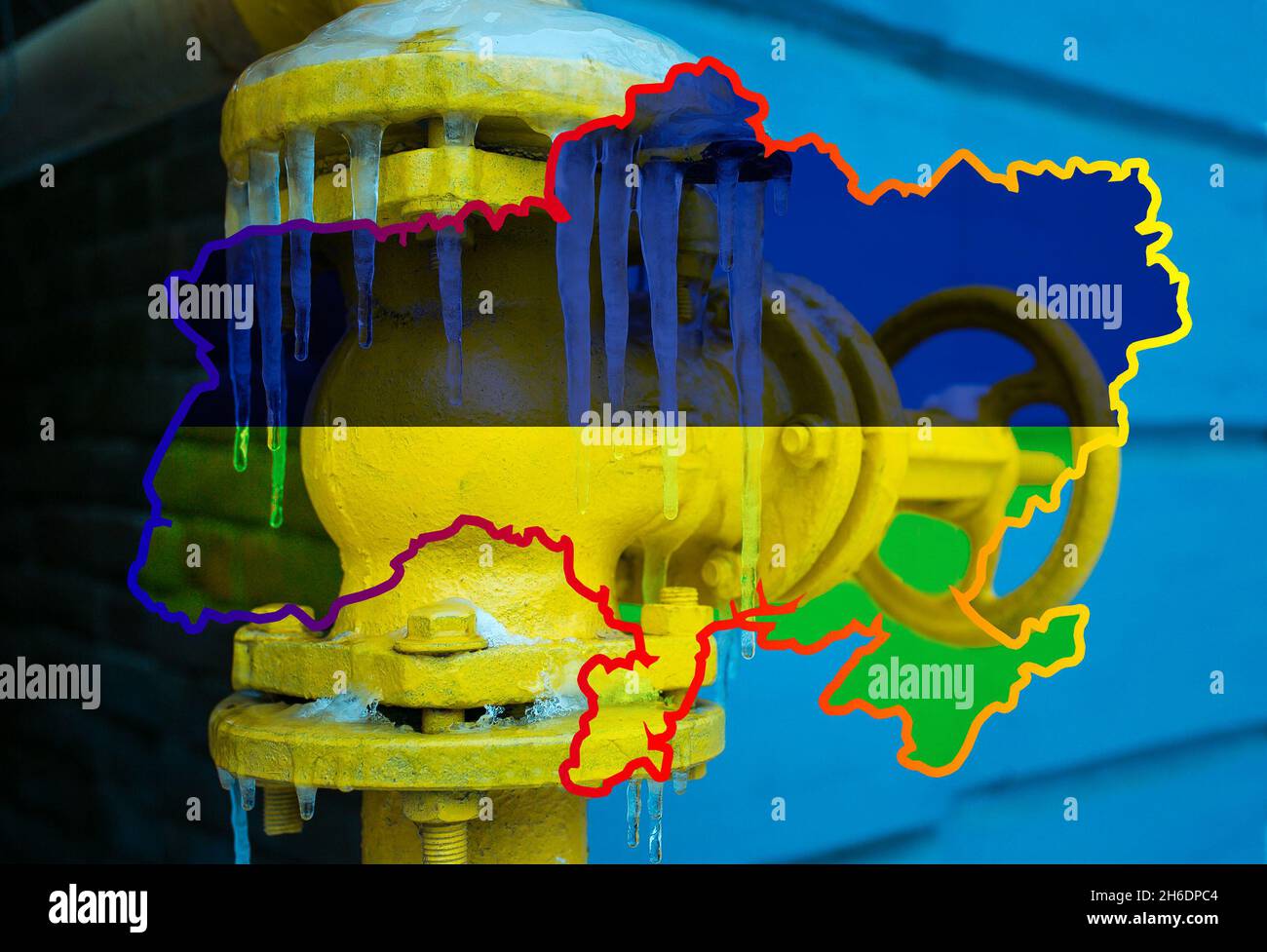 Winter. The yellow gas valve is covered with ice and icicles. Gas tap on a contour map on the flag of Ukraine. Collage. The gas transportation system Stock Photo