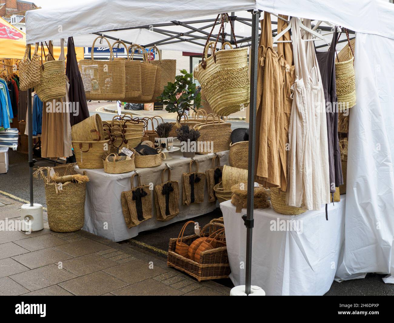 Market stall selling handmade woven eco bags, Lymington, Hampshire, UK Stock Photo